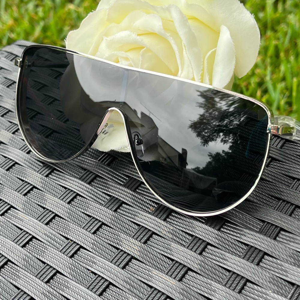 Silver frame flat top sunglasses with black lens